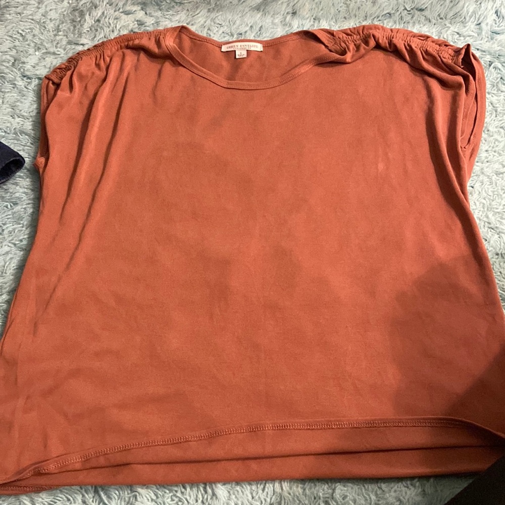 Green envelope burnt orange top